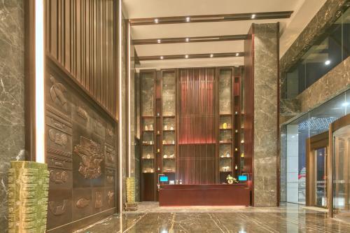 Imagen general del Hotel New Century Manju Liangzhu Hangzhou. Foto 3