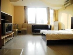 Imagen de la habitación del Hotel New Century Mansion Hotel Shanghai. Foto 3