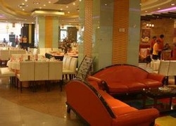 Imagen del bar/restaurante del Hotel New Century Mansion Hotel Shanghai. Foto 2