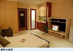 Imagen de la habitación del Hotel New Century Mansion Hotel Shanghai. Foto 5
