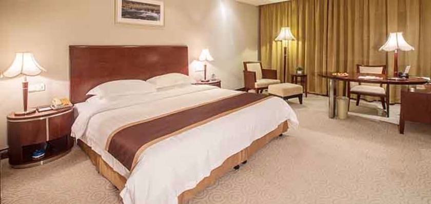 Imagen de la habitación del Hotel New Century Pudong Shanghai. Foto 3