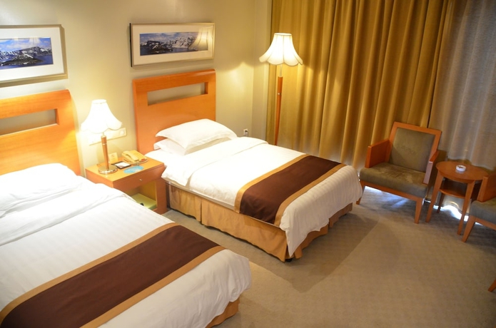 Imagen de la habitación del Hotel New Century Pudong Shanghai. Foto 7