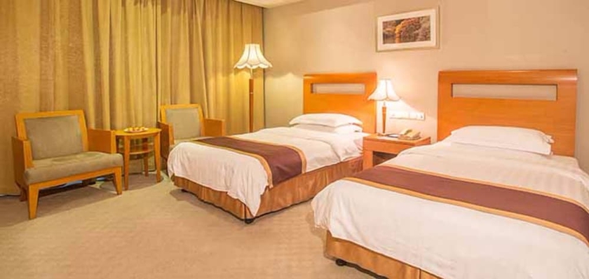 Imagen de la habitación del Hotel New Century Pudong Shanghai. Foto 8