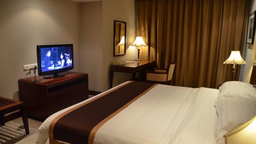 Imagen de la habitación del Hotel New Century Pudong Shanghai. Foto 10