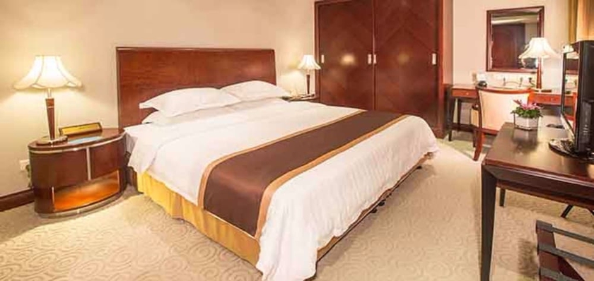 Imagen de la habitación del Hotel New Century Pudong Shanghai. Foto 11