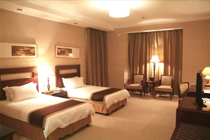 Imagen de la habitación del Hotel New Century Pudong Shanghai. Foto 13