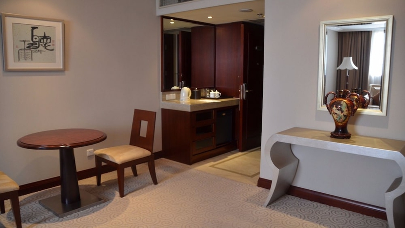 Imagen de la habitación del Hotel New Century Pudong Shanghai. Foto 14