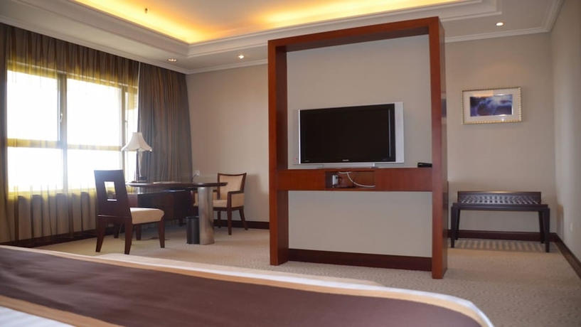 Imagen de la habitación del Hotel New Century Pudong Shanghai. Foto 15