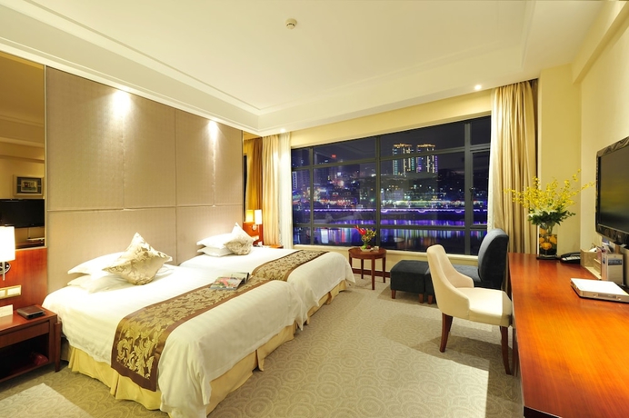 Imagen de la habitación del Hotel New Century Qiandao Longting. Foto 10