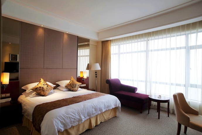 Imagen de la habitación del Hotel New Century Qiandao Longting. Foto 14