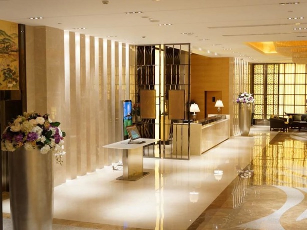 Imagen de la habitación del Hotel New Century - Suzhou. Foto 8