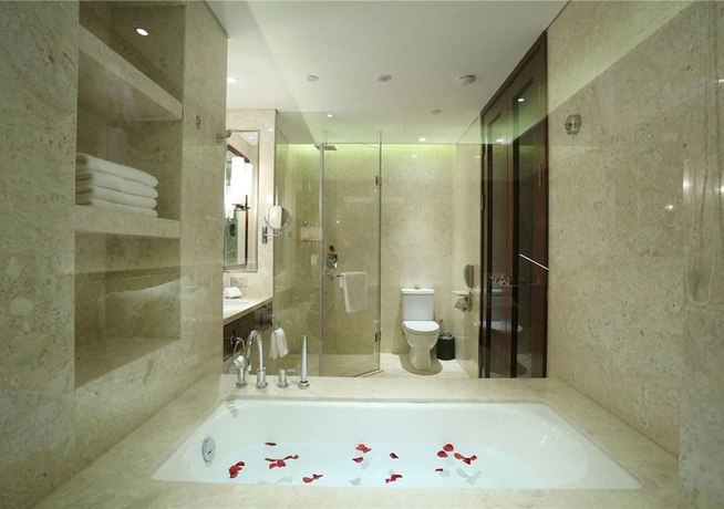 Imagen de la habitación del Hotel New Century Yiwu. Foto 6