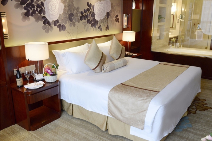 Imagen de la habitación del Hotel New Century Yiwu. Foto 7