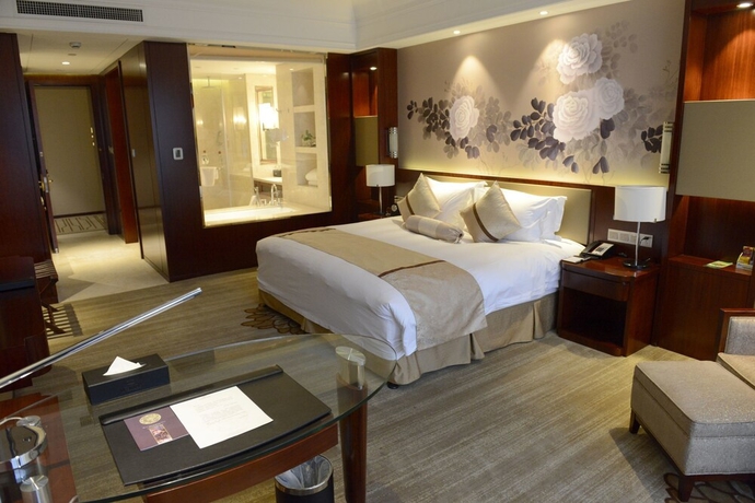 Imagen de la habitación del Hotel New Century Yiwu. Foto 10