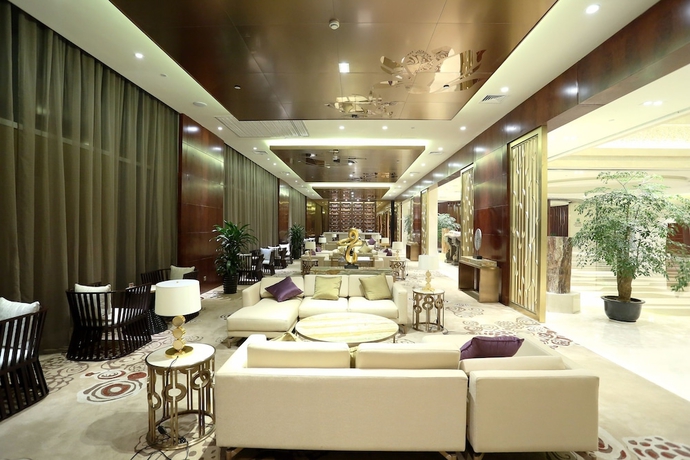 Imagen de los interiores del Hotel New Century Yiwu. Foto 18