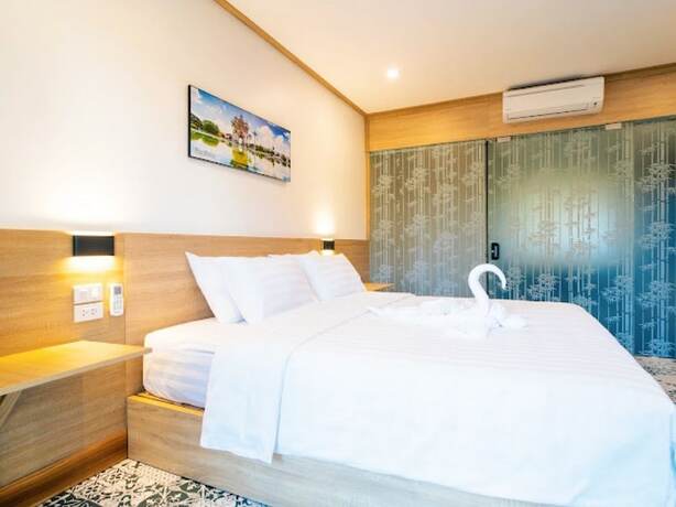 Imagen de la habitación del Hotel New Champa Boutique. Foto 10