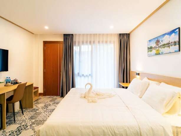 Imagen de la habitación del Hotel New Champa Boutique. Foto 14