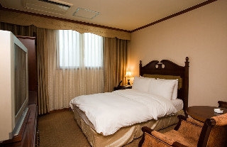 Imagen de la habitación del Hotel New Cheonji Seoul. Foto 11