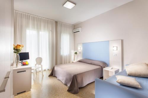 Imagen de la habitación del Hotel New Chiari. Foto 8