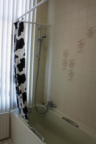 Imagen de la habitación del Hotel New City Scheveningen. Foto 7