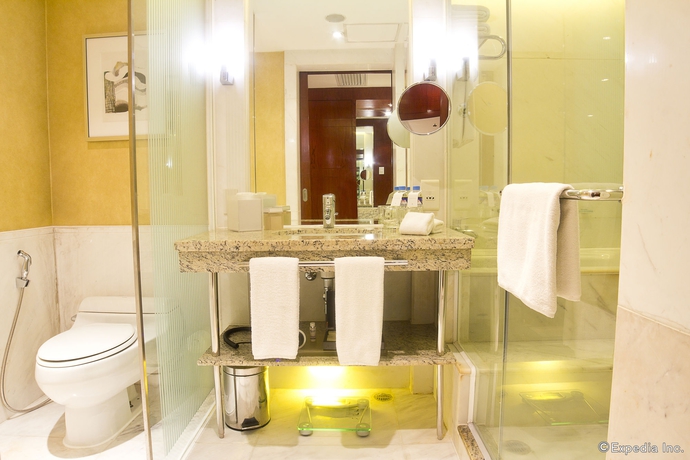 Imagen de la habitación del Hotel New Coast Manila. Foto 3