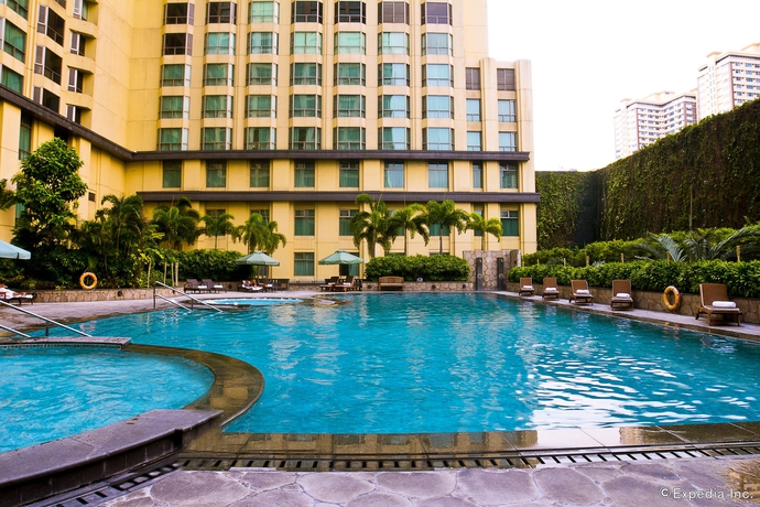 Imagen de la piscina del Hotel New Coast Manila. Foto 16