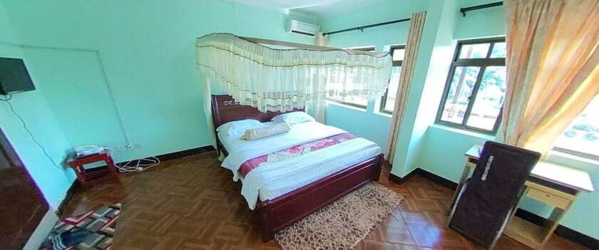 Imagen de la habitación del Hotel New Coffee Tree. Foto 18