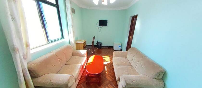 Imagen de la habitación del Hotel New Coffee Tree. Foto 19