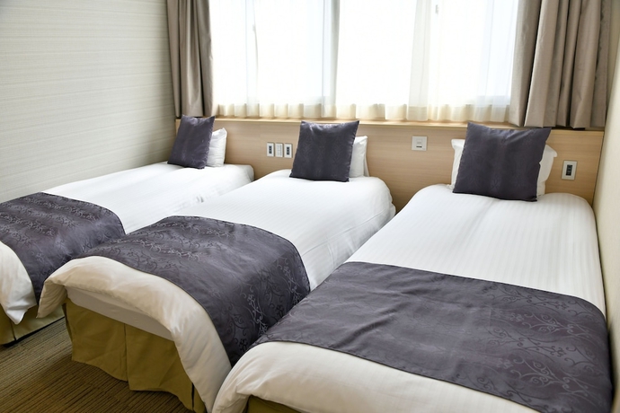 Imagen de la habitación del Hotel New Commander Osaka Neyagawa. Foto 7