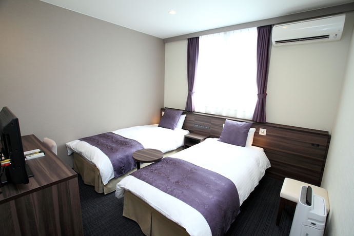 Imagen de la habitación del Hotel New Commander Osaka Neyagawa. Foto 8