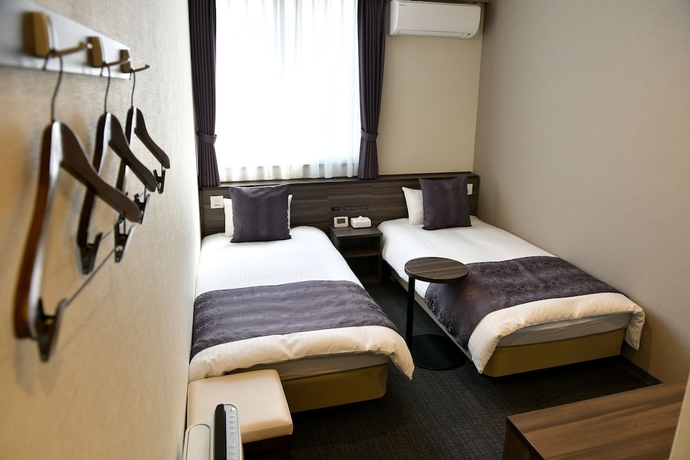 Imagen de la habitación del Hotel New Commander Osaka Neyagawa. Foto 9