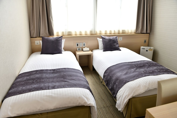 Imagen de la habitación del Hotel New Commander Osaka Neyagawa. Foto 10