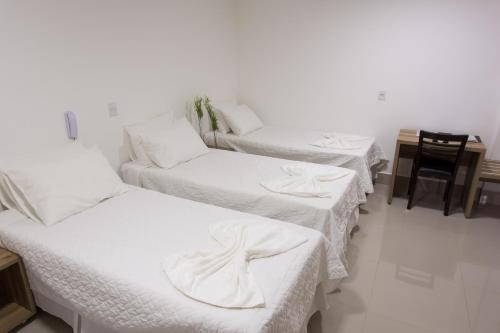 Imagen de la habitación del Hotel New Concept. Foto 7