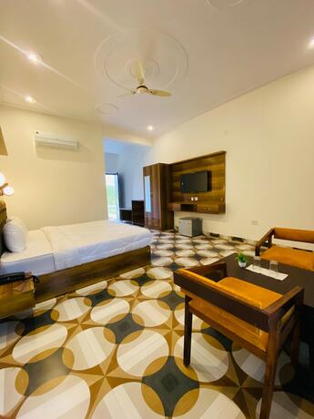 Imagen de la habitación del Hotel New Corbett and Resort. Foto 19