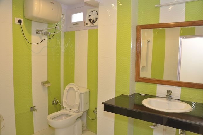 Imagen de la habitación del Hotel New Cosmos, Shimla. Foto 9