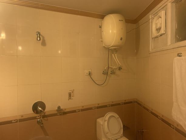 Imagen de la habitación del Hotel New Cosmos, Shimla. Foto 11