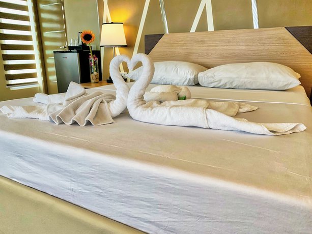 Imagen de la habitación del Hotel New Dawn Plus. Foto 4