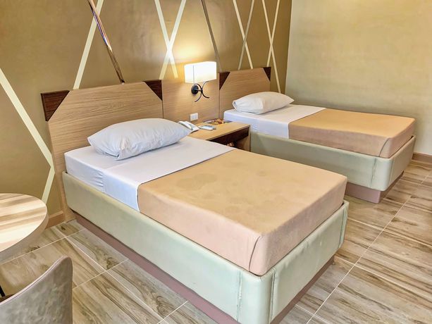 Imagen de la habitación del Hotel New Dawn Plus. Foto 5
