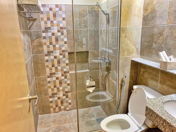 Imagen de la habitación del Hotel New Dawn Plus. Foto 6