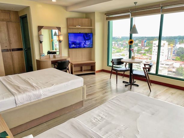 Imagen de la habitación del Hotel New Dawn Plus. Foto 7