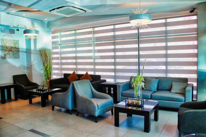 Imagen del bar/restaurante del Hotel New Dawn Plus. Foto 3