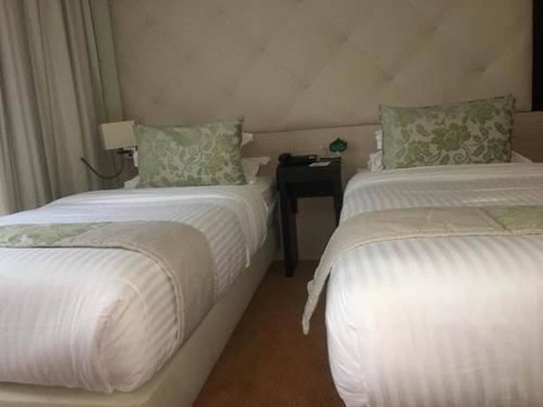 Imagen de la habitación del Hotel New Day. Foto 2