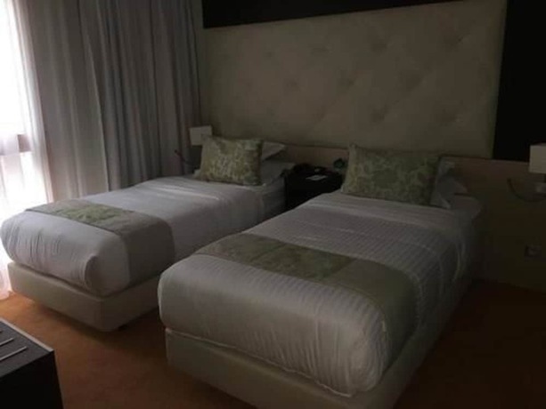 Imagen de la habitación del Hotel New Day. Foto 10