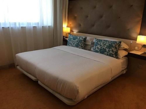 Imagen de la habitación del Hotel New Day. Foto 11