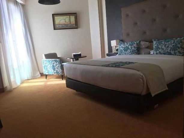 Imagen de la habitación del Hotel New Day. Foto 15