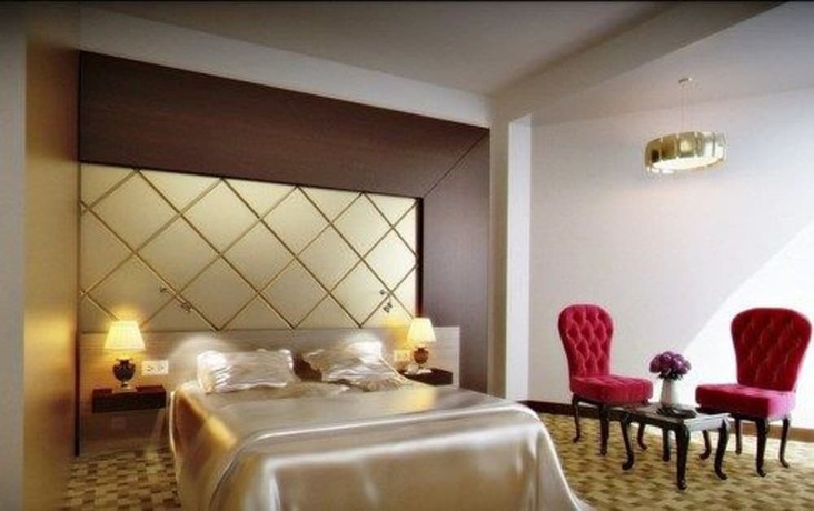 Imagen de la habitación del Hotel New Day. Foto 17