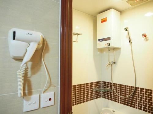 Imagen de la habitación del Hotel New Day Night Hostel, Kowloon. Foto 6