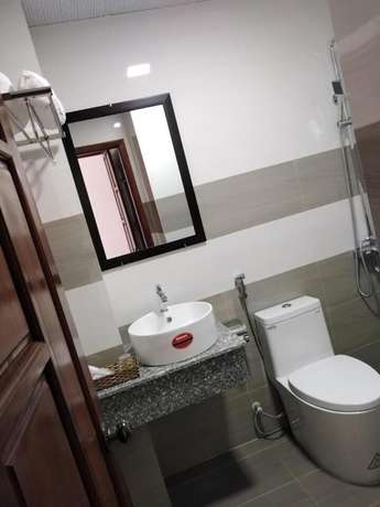 Imagen de la habitación del Hotel New Day Quy Nhon. Foto 6