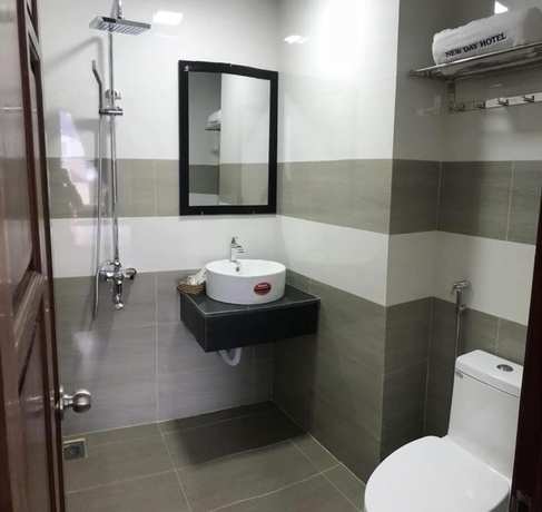 Imagen de la habitación del Hotel New Day Quy Nhon. Foto 8