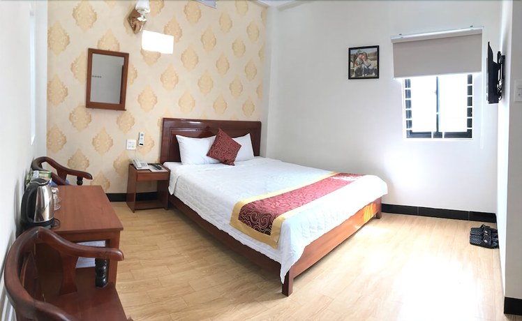 Imagen de la habitación del Hotel New Day Quy Nhon. Foto 12
